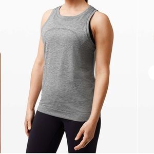 Lululemon Swiftly Relaxed Tank Top size 6
Color: Slate/White